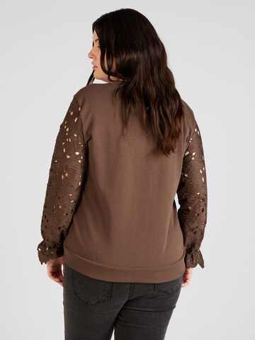 ONLY Carmakoma Sweatshirt 'WANTED' in Brown