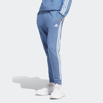 ADIDAS SPORTSWEAR Tapered Workout Pants in Blue: front