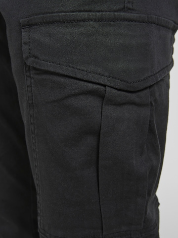 Tapered Pantaloni 'JPSTMarco JJJoe' de la Jack & Jones Junior pe negru