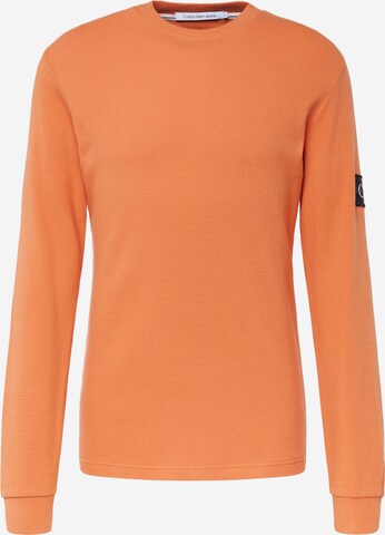 Tricou de la Calvin Klein Jeans pe portocaliu: față