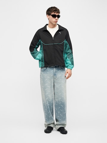 PUMA Övergångsjacka 'PUMATECH-X' i svart