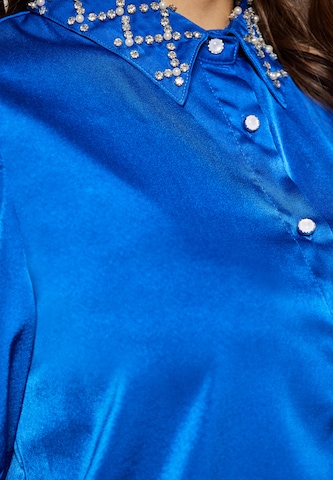 Camicia da donna di faina in blu