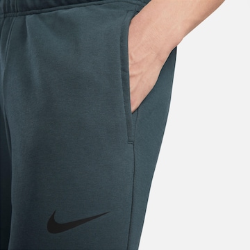 NIKE Tapered Sporthose in Blau