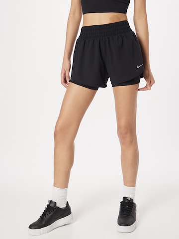 NIKE Regular Workout Pants in Black: front