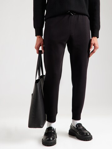 ARMANI EXCHANGE Tapered Housut värissä musta: etupuoli