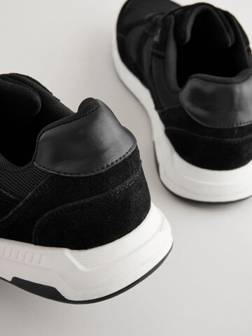 Baskets basses Next en noir