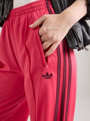 ADIDAS ORIGINALS Bő szár Nadrág 'Firebird' - rózsaszín