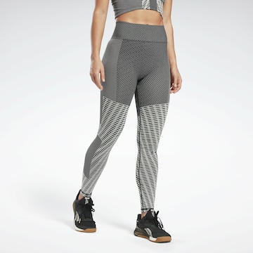 Skinny Pantalon de sport Reebok en gris : devant