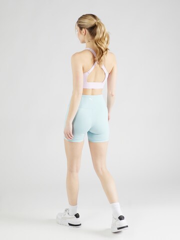 PUMA Skinny Sportbroek in Blauw