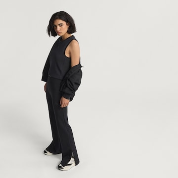 évasé Pantalon de sport 'All Szn' ADIDAS SPORTSWEAR en noir