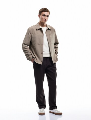 Koton Loose fit Pleat-front trousers in Brown: front