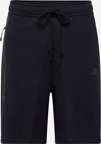 Loosefit Pantaloni de la Nike Sportswear pe negru: față