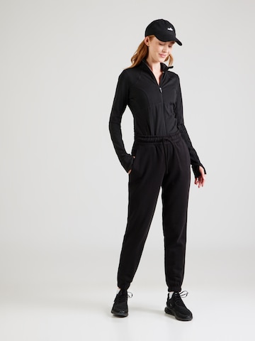 Tapered Pantaloni sportivi di 4F in nero