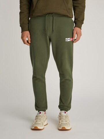 Tommy Jeans Tapered Trousers in Green: front