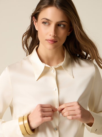 Camicia da donna di oltre in beige