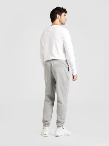 TOMMY HILFIGER Tapered Trousers 'Essential' in Grey