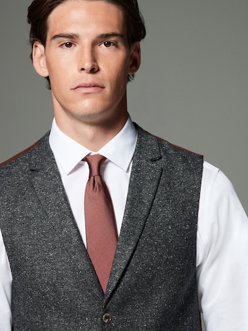 Next - Chaleco para traje en gris