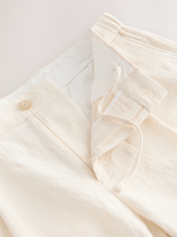 regular Pantaloni con pieghe di Next in beige