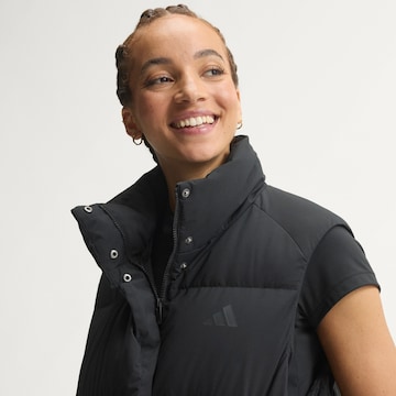 ADIDAS SPORTSWEAR - Chaleco deportivo 'Helionic' en negro