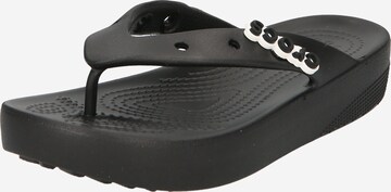 Crocs T-Bar Sandals in Black: front