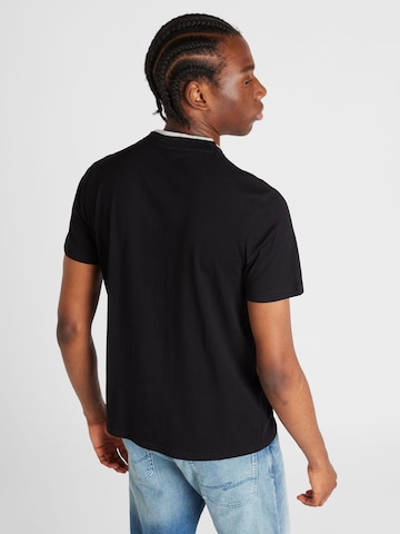 Tricou de la QS pe negru