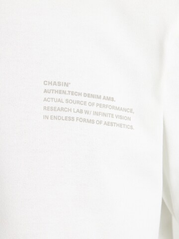 T-Shirt 'Xpose' CHASIN' en blanc