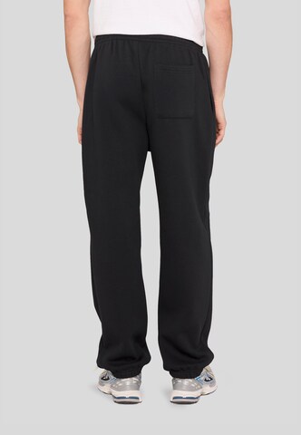 Effilé Pantalon 'LA Dynasty' Mister Tee en noir