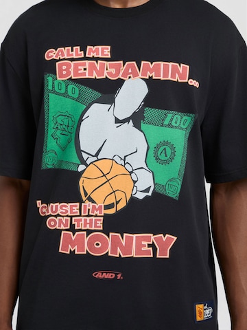 AND1 T-shirt 'Auf Dem Geld' i svart