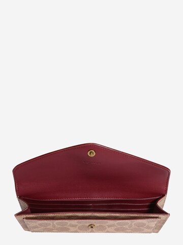 Porte-monnaies COACH en rouge