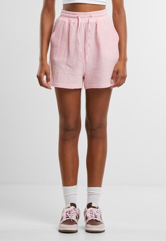 Urban Classics Loose fit Trousers in Pink: front