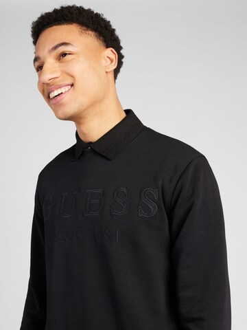 GUESS Sweatshirt 'BEAU' in Schwarz