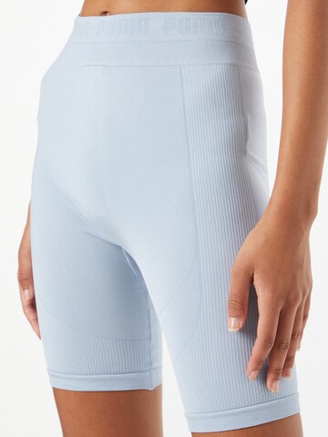 PUMA Skinny Sports trousers in Blue