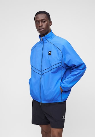 Nike Sportswear Φθινοπωρινό και ανοιξιάτικο μπουφάν 'AIR' σε μπλε
