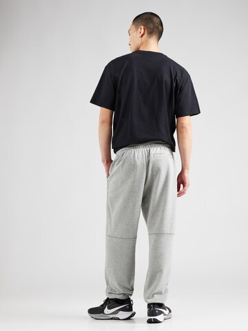 NIKE Tapered Παντελόνι φόρμας 'HERITAGE' σε γκρι