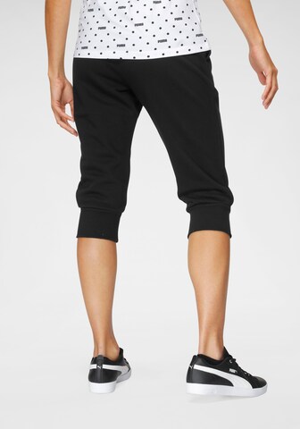 PUMA Tapered Sportbroek in Zwart