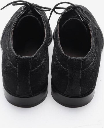 Tod's Flats & Loafers in 43 in Black