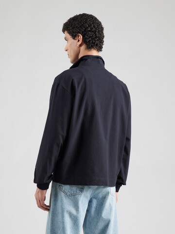 ADIDAS ORIGINALS Φθινοπωρινό και ανοιξιάτικο μπουφάν 'ESS+' σε μαύρο