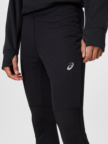 ASICS Skinny Spodnie sportowe 'Windblock' w kolorze czarny