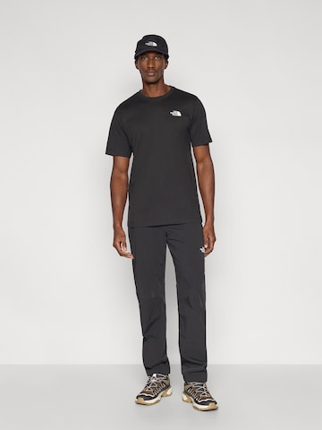 Tricou 'BOX NSE CELEBRATION' de la THE NORTH FACE pe negru