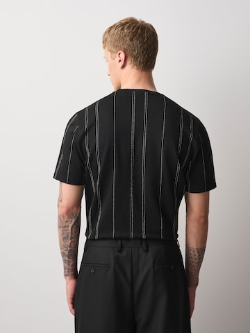 T-Shirt Next en noir
