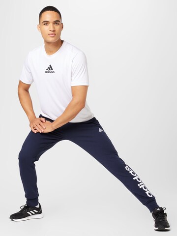 ADIDAS SPORTSWEAR Tapered Workout Pants 'Essentials French Terry Tapered Cuff Logo' in Blue