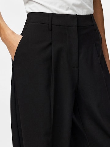 PIECES Baggy Панталон с набор 'PCBOSELLA' в черно