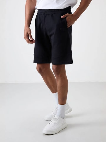 Regular Pantalon Tommy Life en noir