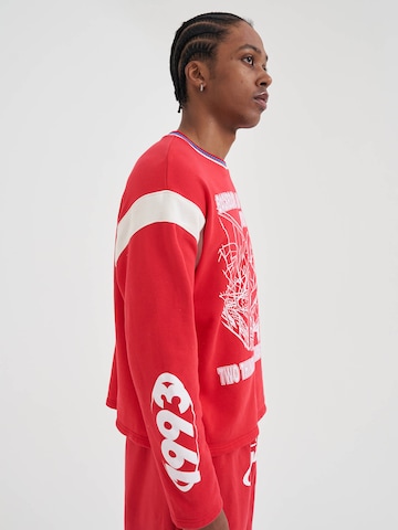 AND1 Bluzka sportowa w kolorze czerwony