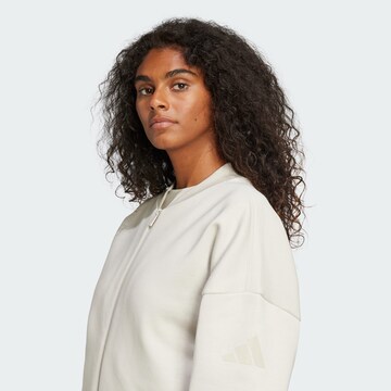 ADIDAS SPORTSWEAR - Sudadera con cremallera deportiva 'Essentials' en beige