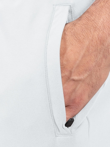 Effilé Pantalon de sport 'Delian' Smilodox en gris