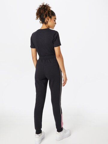juoda ELLESSE Siaurėjantis Sportinės kelnės 'America'