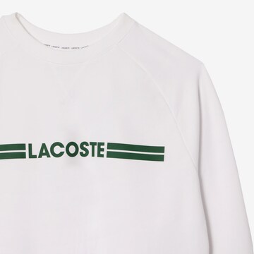 Felpa di LACOSTE in bianco