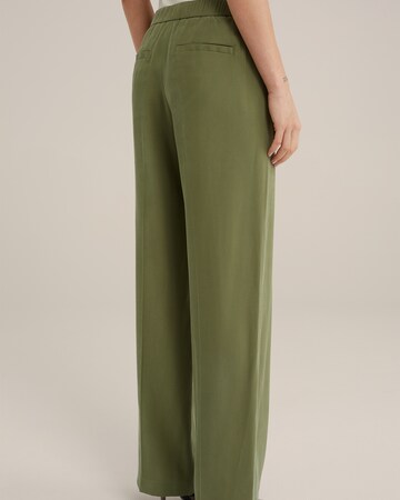 WE Fashion Szeroka nogawka Spodnie w kolorze zielony
