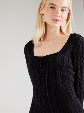 Rochie tricotat 'Palo Santo' de la florence by mills exclusive for ABOUT YOU pe negru